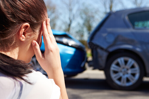 woman upset after car accident