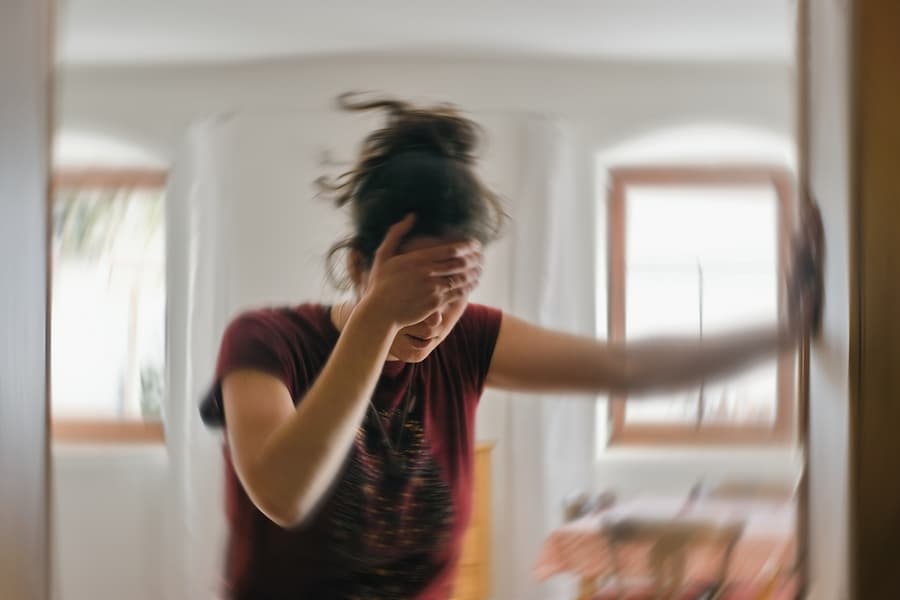 woman suffering from vertigo