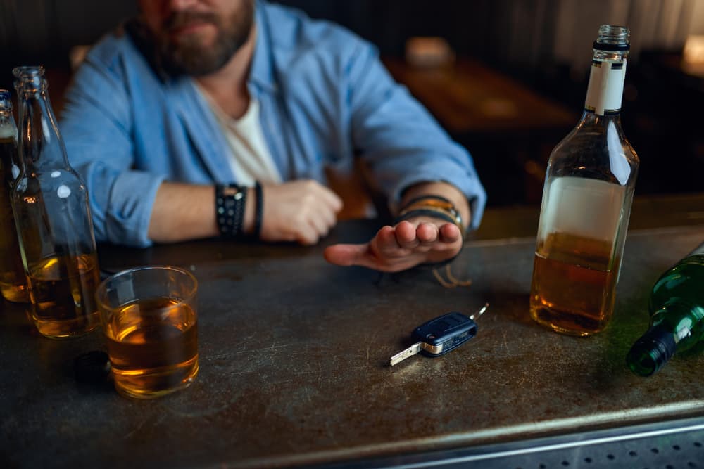 drunk man refusing to drive under the influence of alcohol
