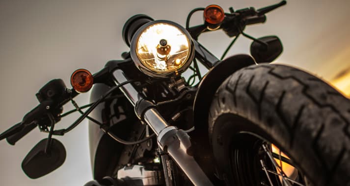 Low-angle Close-up Photo of Parked Harley Davidson Motorcycle