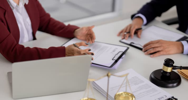 Lawyers professionals discuss legal documents during consultatio