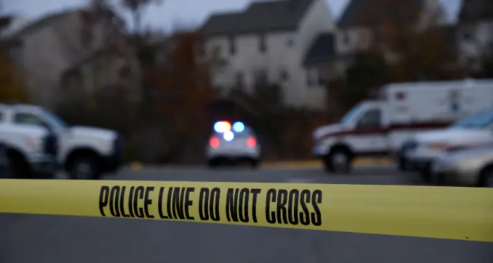 Crime scene with a marked police cruiser