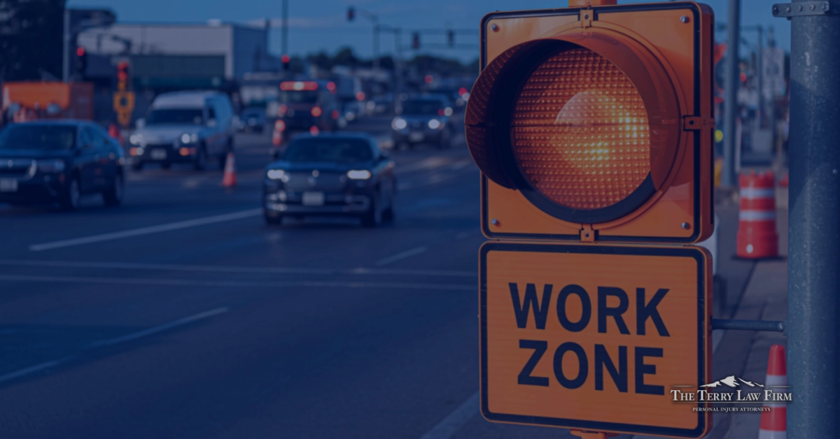 Orange traffic cones and road work signs in a Tennessee highway construction zone