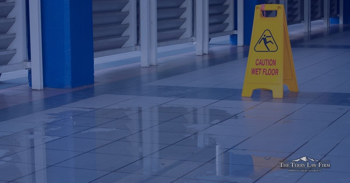 Caution wet floor sign in a store aisle, illustrating the one-year deadline to file a Tennessee premises liability claim.
