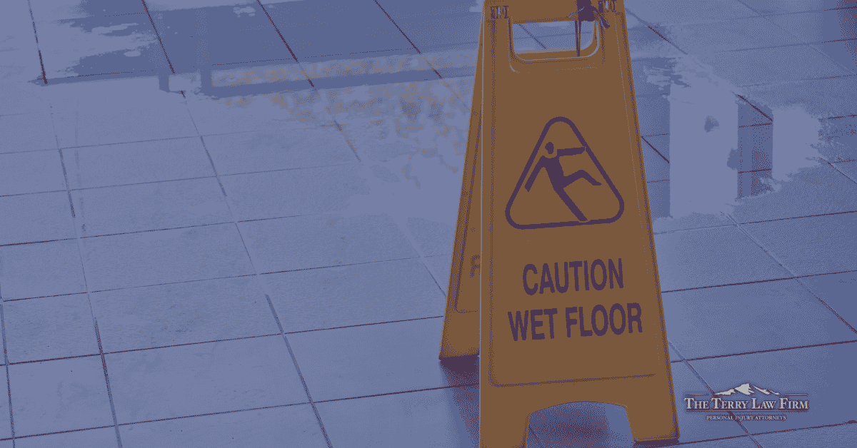 Caution sign on a wet floor in a Tennessee store where a property owner knew about the hazard